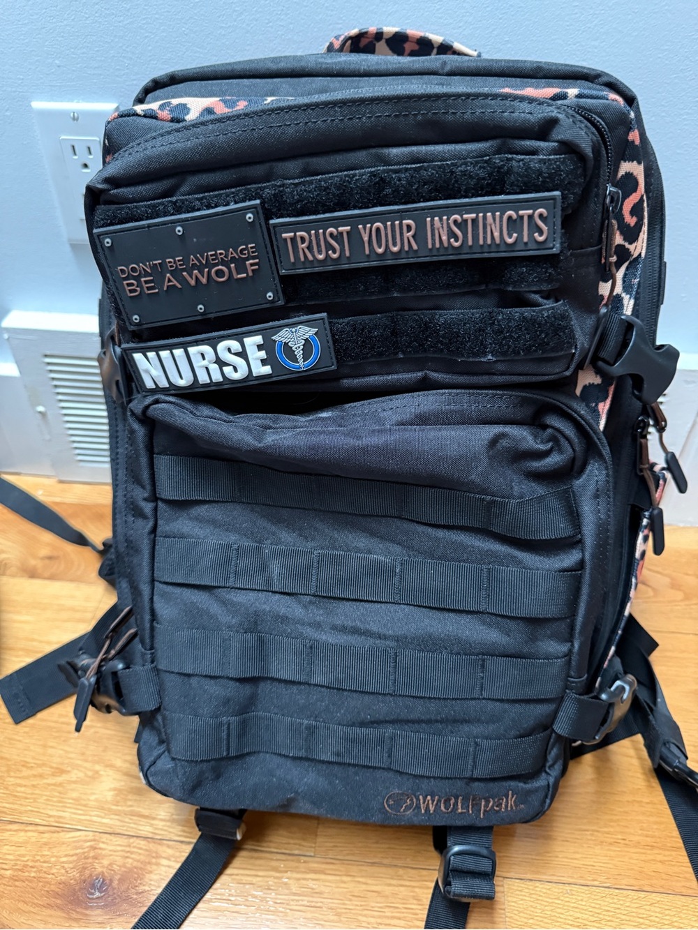 WOLFPAK Tactical Backpack in Black with Rose Leopard Trim